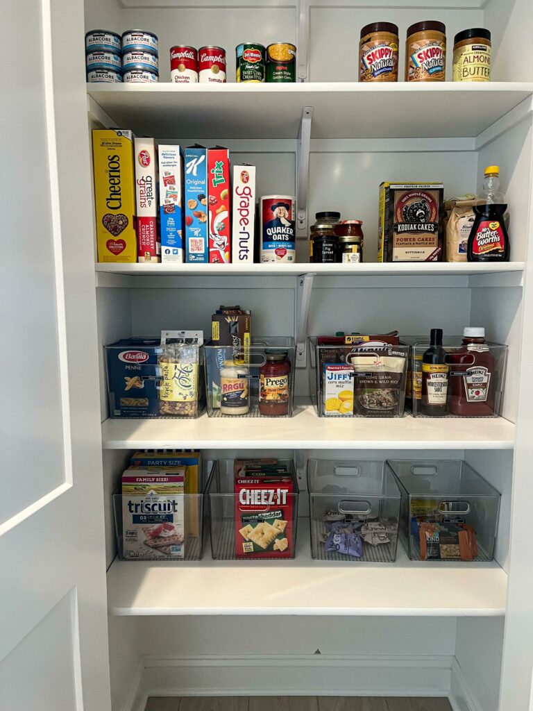 An easy pantry with 8 clear bins and 8 labels @eightdayshomeorganization